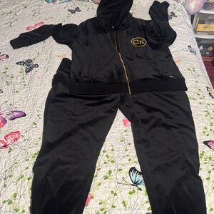 Calvin Klein Black Apparel with Gold Detail